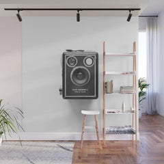 A Kodak Brownie analog vintage camera on a white background Retro photography in black and white Wall Mural