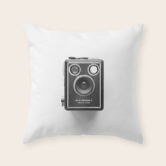 A Kodak Brownie analog vintage camera on a white background  Retro photography in black and white Throw Pillow