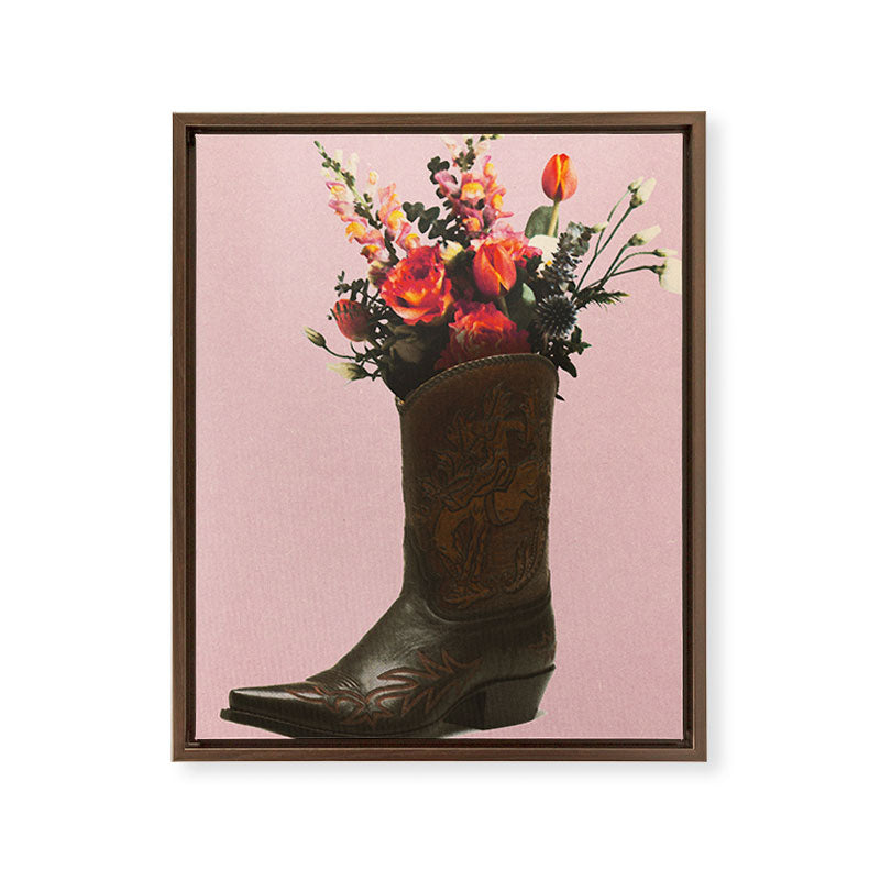 A Cowboy Boot With Spring Bouquet Framed Canvas Print
