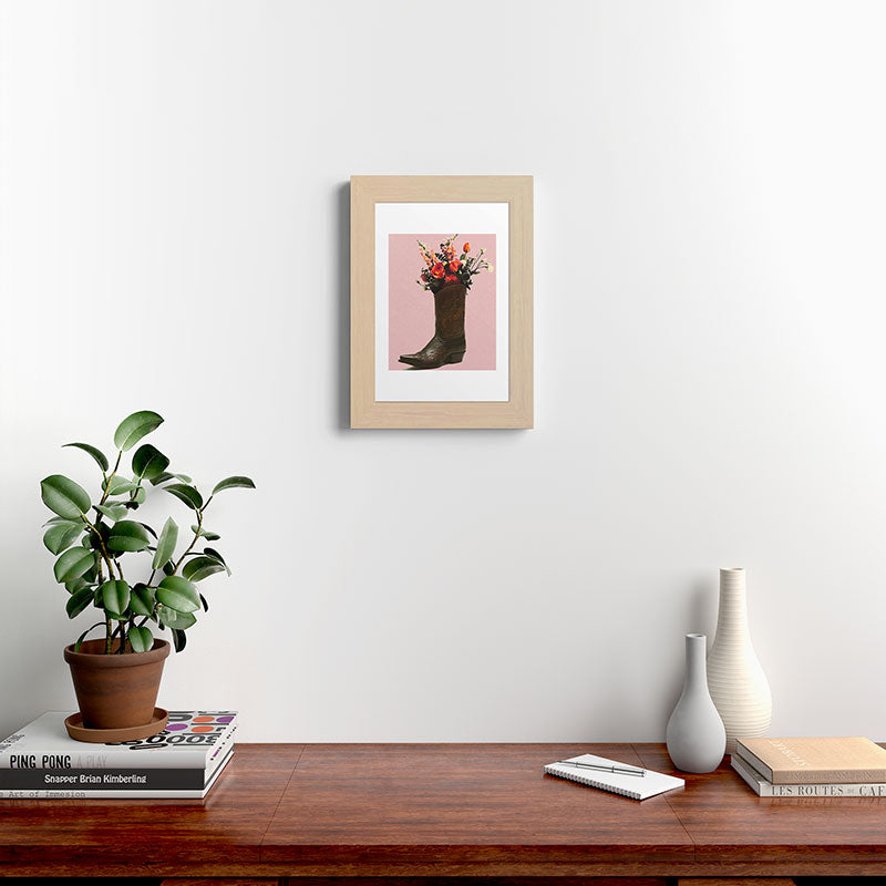A Cowboy Boot With Spring Bouquet Framed Art Print