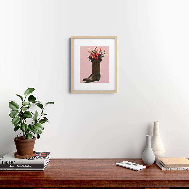 A Cowboy Boot With Spring Bouquet Framed Art Print