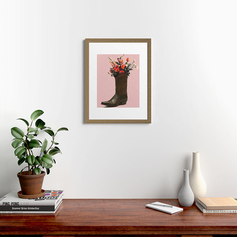 A Cowboy Boot With Spring Bouquet Framed Art Print