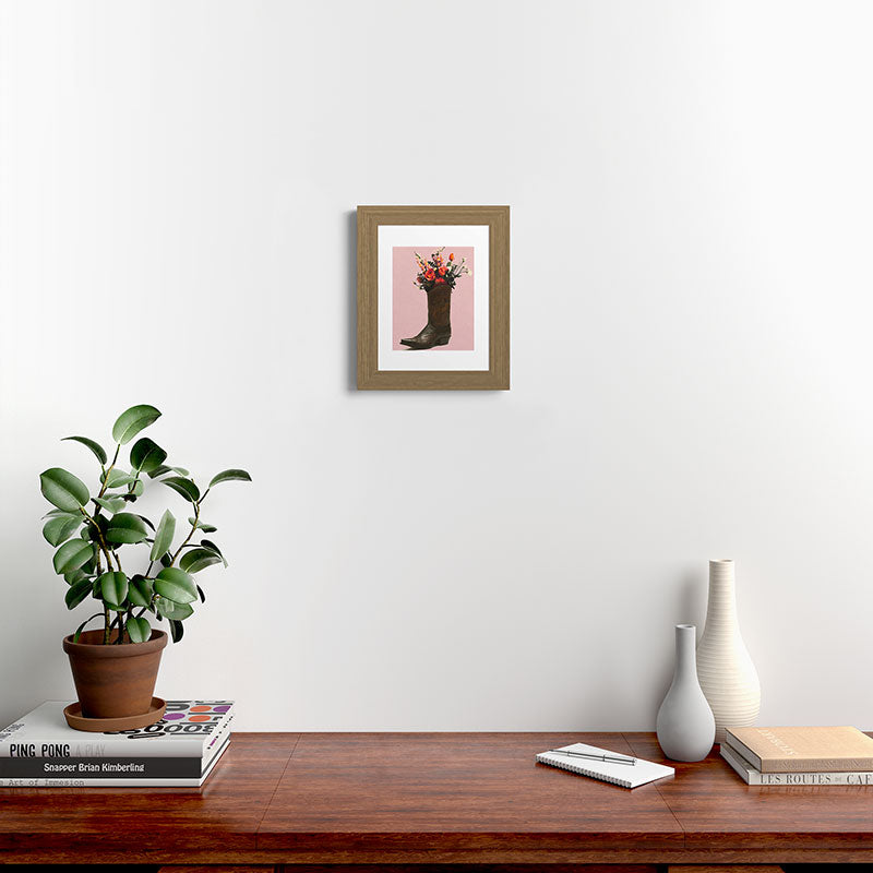 A Cowboy Boot With Spring Bouquet Framed Art Print