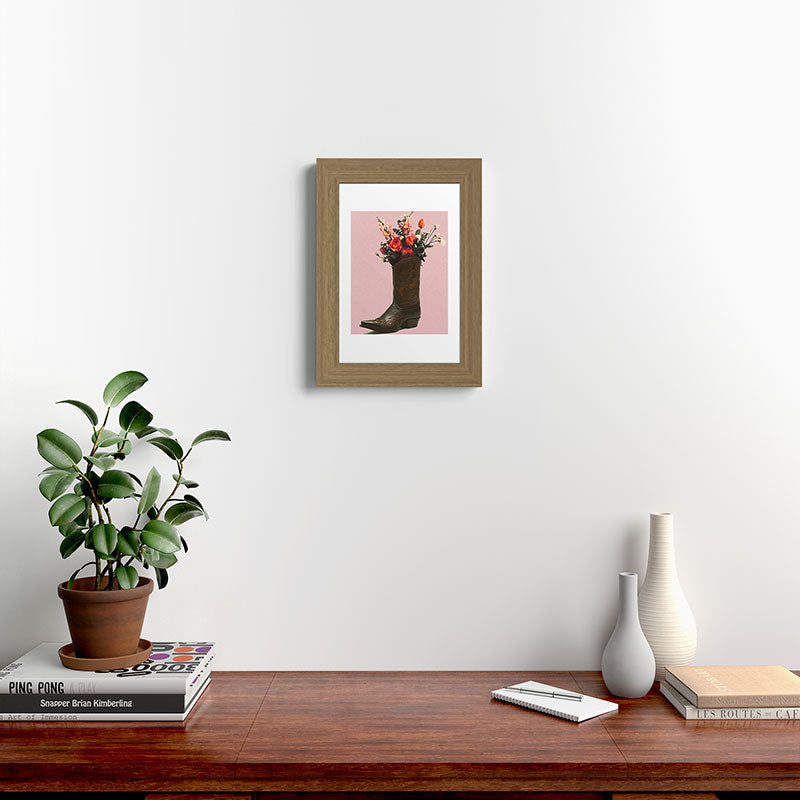 A Cowboy Boot With Spring Bouquet Framed Art Print