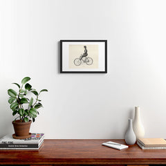 "Coasting" from "Bicycling for Ladies" by Maria E. Ward, 1896 Framed Art Print