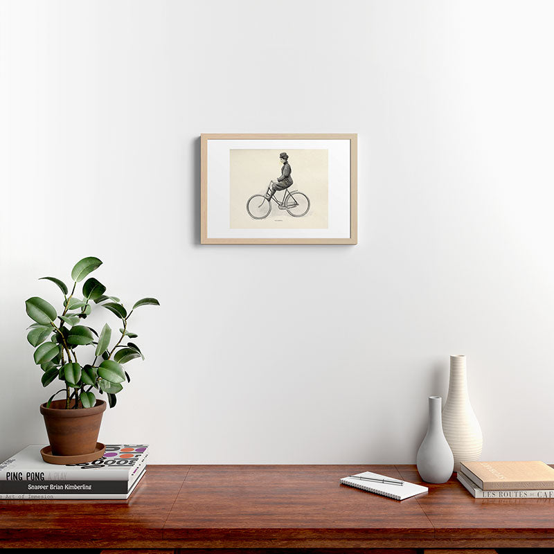 "Coasting" from "Bicycling for Ladies" by Maria E. Ward, 1896 Framed Art Print