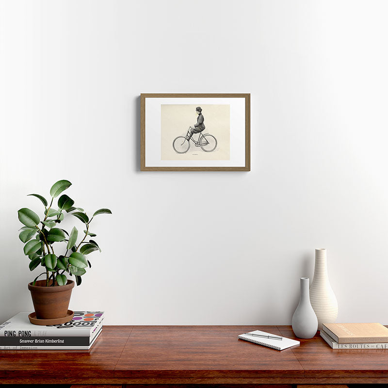 "Coasting" from "Bicycling for Ladies" by Maria E. Ward, 1896 Framed Art Print