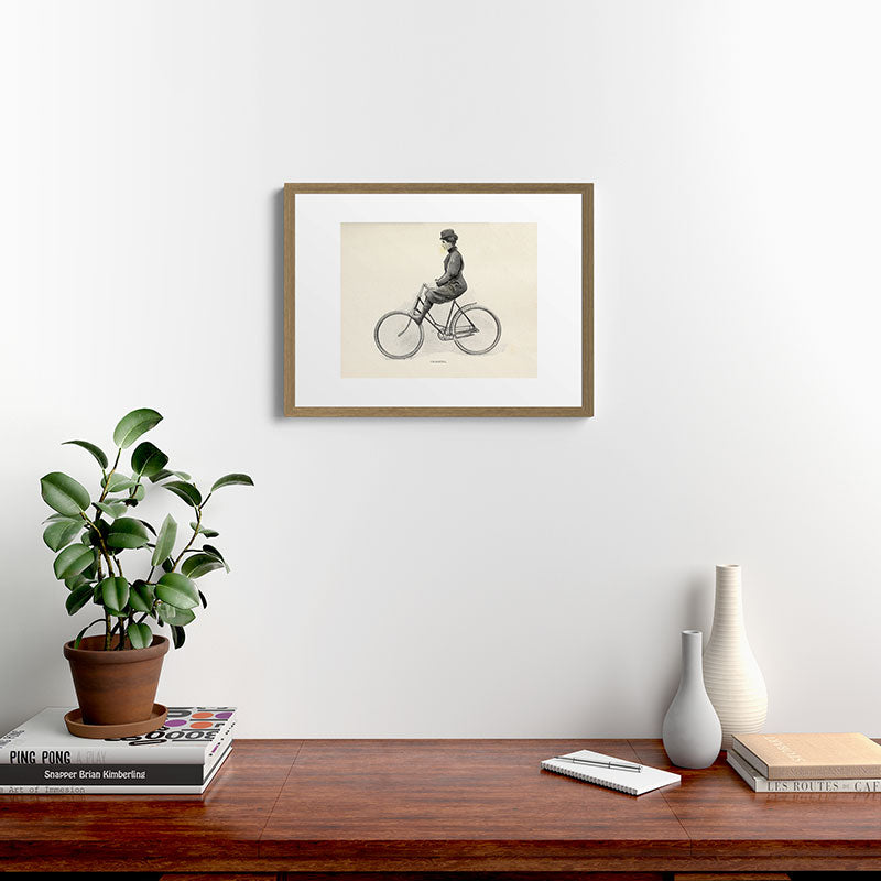 "Coasting" from "Bicycling for Ladies" by Maria E. Ward, 1896 Framed Art Print