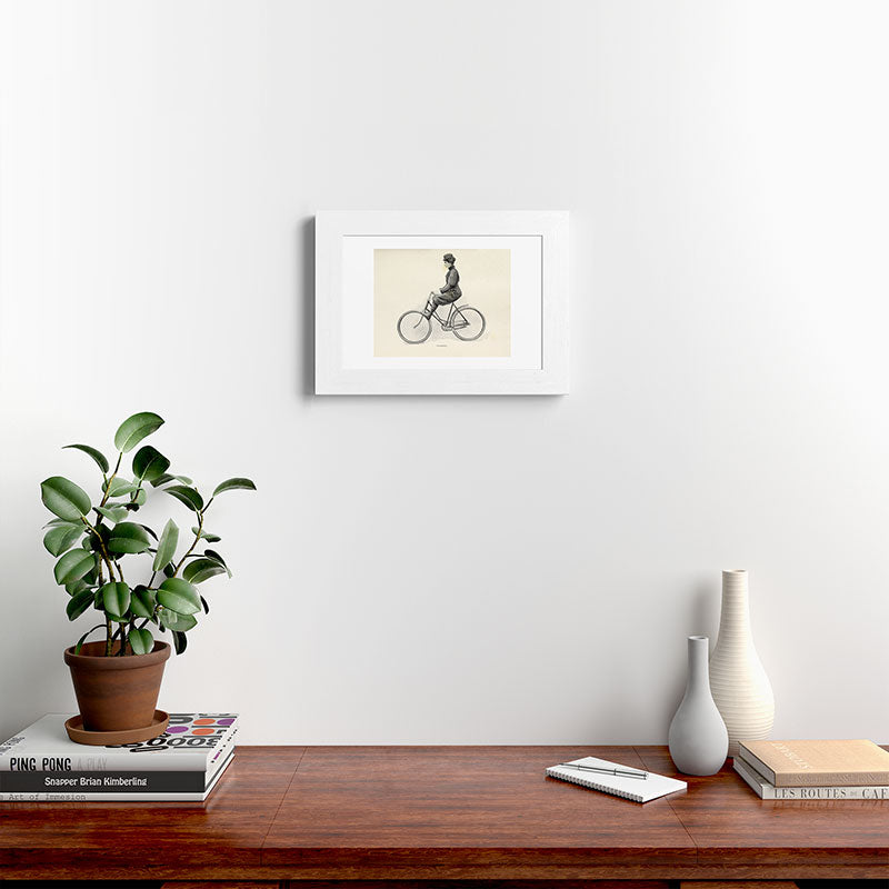 "Coasting" from "Bicycling for Ladies" by Maria E. Ward, 1896 Framed Art Print